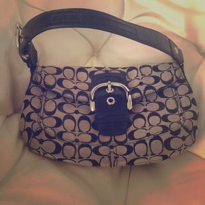 COACH Soho Signature Pocket Flap Purse